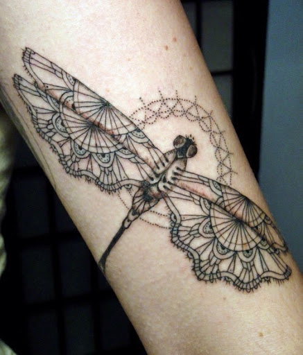 dragonfly face tattoos