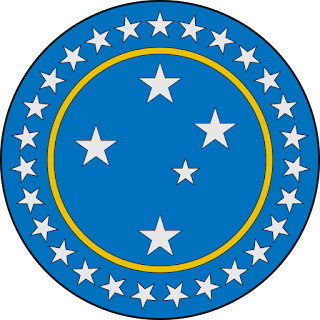 Escudo das armas nacionais brasileiras: de azul com cinco estrelas de prata, postas como a constelação do Cruzeiro do Sul; bordadura de azul, debruada de ouro, carregada de vinte e sete estrelas de prata.