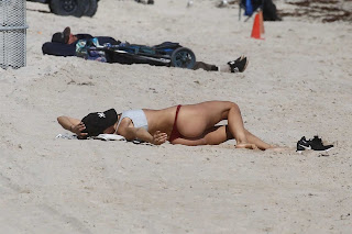 Kimberley Garner in Red Bikini Bottoms at a Beach in Miami, Florida