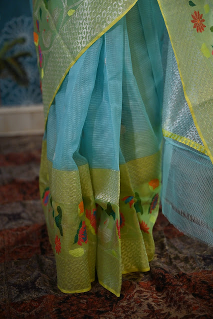 Pure zari kota doria with a skirt border of lotus and swans.