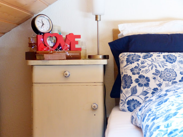 Small Apartment Bedroom with slanted walls.I love how she worked with the slanted walls making the small aparment bedroom still feel there is a lot of space! And she was able to put away so many things and it looks beautiful. Check it out!