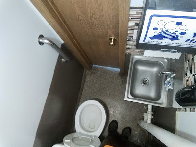 An over head view of a small bathroom.