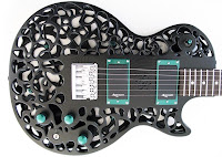 http://www.guitarworld.com/another-dimension-odd-3-d-printed-guitars