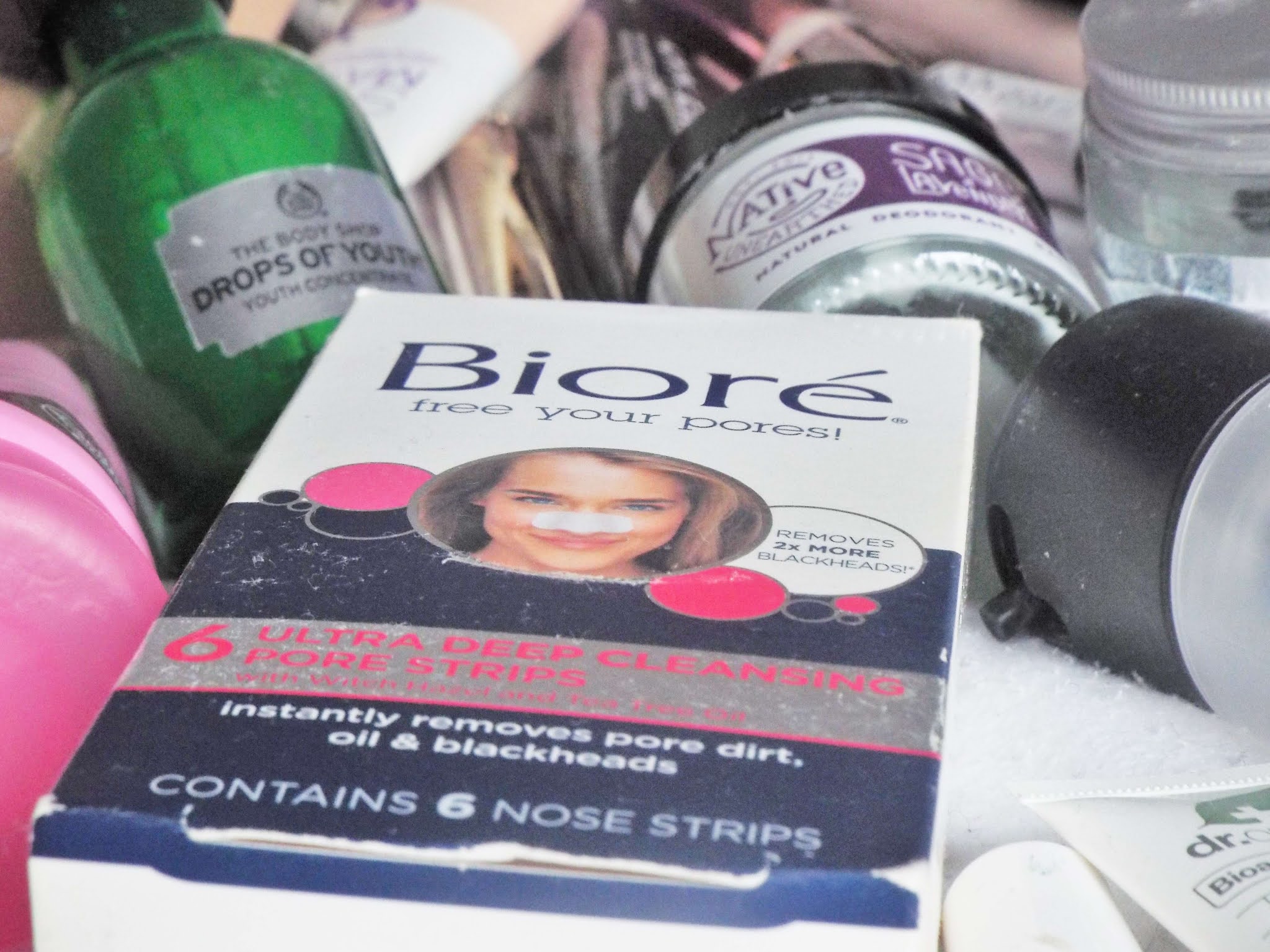 Biore Ultra Deep Cleansing Pore Strips, packaged in cardboard box,with lady looking happy wearing nose strip on front.