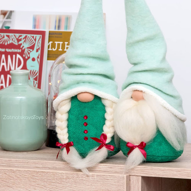 two handmade Christmas gnomes with mint hats by sewing patterns of Zatinatskaya Natalia