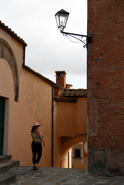 Katy Standing in Piazza in San Miniato Tuscany Italy