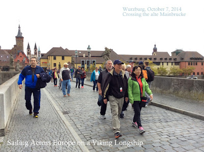 Viking River Cruises - passengers cross the Main River Bridge, Wurzburg