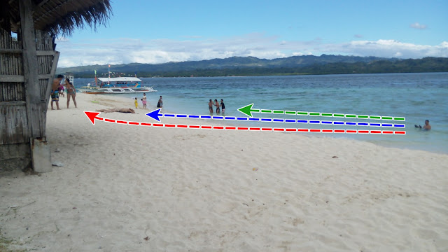people enjoying their time on the beach at Canigao Island, Matalom Leyte