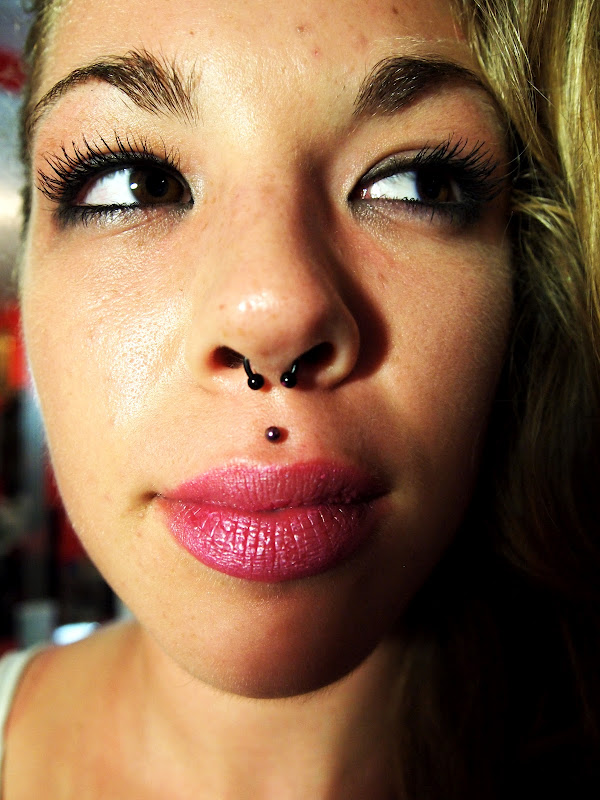 Roughly month old happy medusa piercing. Done at Tsunami Tattoo, Ibiza  title=