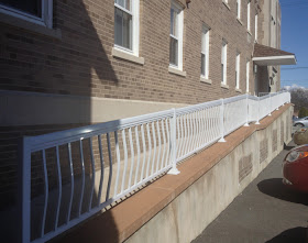 long ramp to side entrance of an apartment building