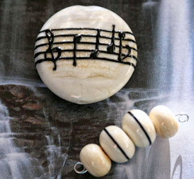 Lampwork glass, music notes on staff art bead by Heather Behrendeth :: All Pretty Things