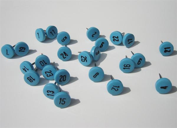 blue and black numbered map pins