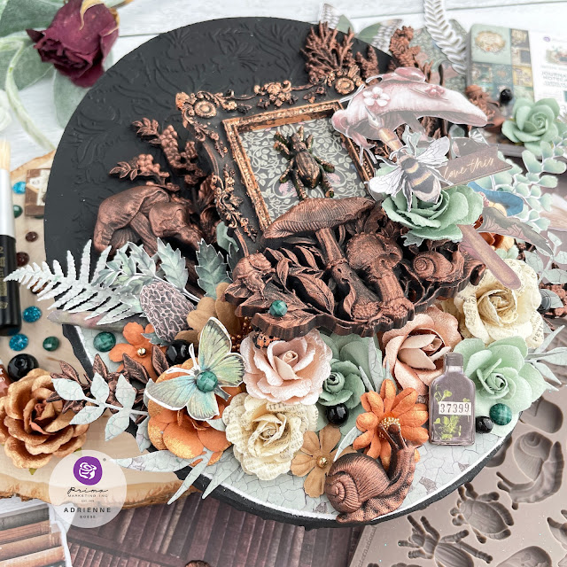 Dark academia aesthetic mixed media canvas created with Finnabair wax, moulds, paint and gesso; plus Prima Marketing's new Nature Academia collection paper, moulds, ephemera and flowers.