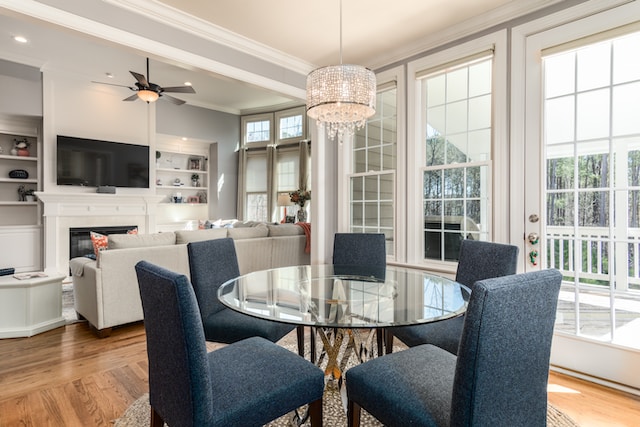 a dining room with navy chairs