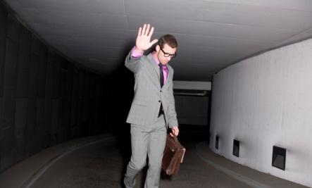 Why Men Have Difficulty with Intimacy - shy guy man business man wearing suit carrying  suitcase