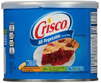 Crisco All Vegetable Shortening - a lot cheaper than brand name diaper creams and usually works just as well