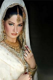 Cute Pakistani Model in a White Bridal Dress with Naughty Look