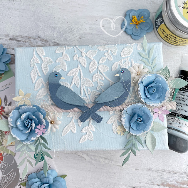 Mixed media canvas created with Sizzix Expand Paste and Sweet Birds Die with Prima Marketing paper flowers.