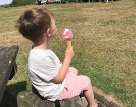 at the beach enjoying an icecream 