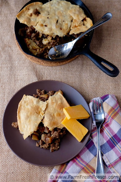 Ground beef and sautéed turnips topped with pie crust and baked in a skillet. Hearty comfort food from the farm share.