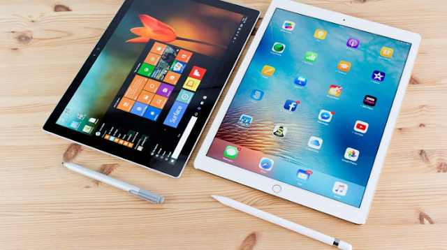 Apple iPad vs. Microsoft Surface Picking the Right Tablet for Your Needs