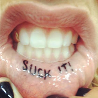 ke$sha's suck it tattoo