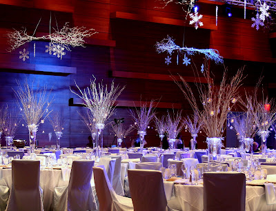 Centerpieces consisted of glittered branches icicle garlands 