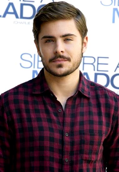 Foto de Zac Efron con bigote y barba