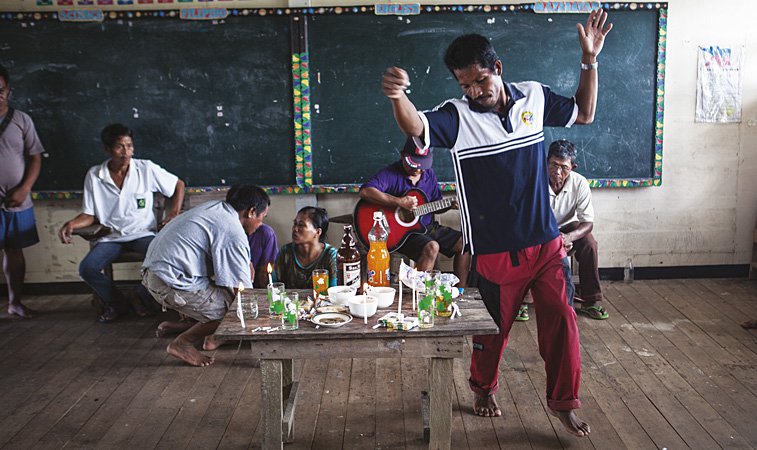 Agusanon Manobo performing a ritual inside a floating school in Panlabuhan, Agusan Marsh