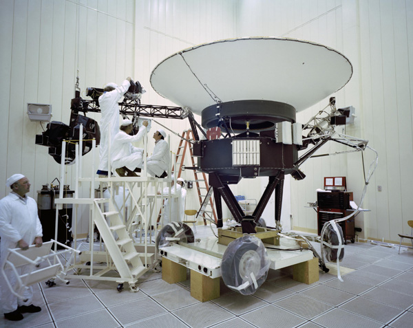 Engineers work on NASA's Voyager 2 spacecraft at the Jet Propulsion Laboratory near Pasadena, California...on March 23, 1977.