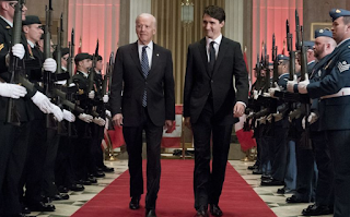 Biden Hails Trudeau, Merkel as Last Liberal Leaders Standing 