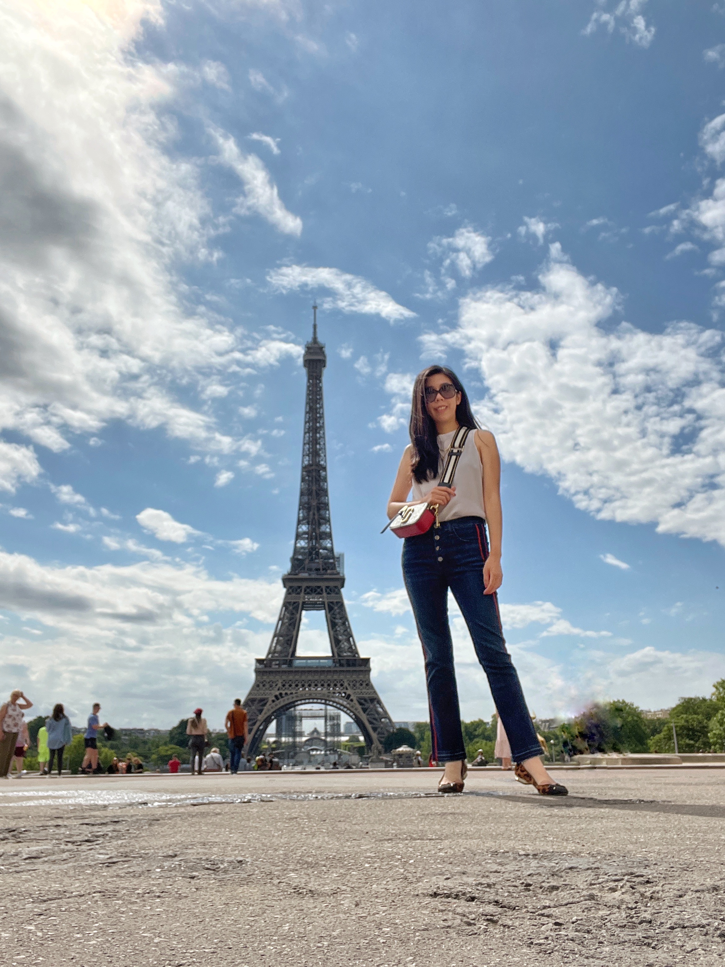 Adrienne Nguyen_Vince Silk Sleeveless Top_Veronica Beard High waisted Jeans_Leopard Karl Lagerfeld Flats_Marc Jacobs Snapshot crossbody_Chanel Sunglasses