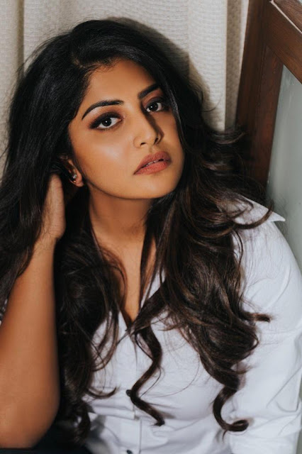 Manjima Mohan in a captivating pose, showcasing elegance in her latest photoshoot.