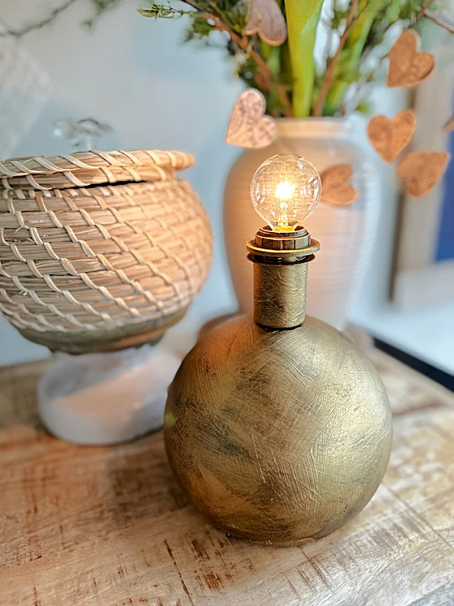 gold lamp with light and basket