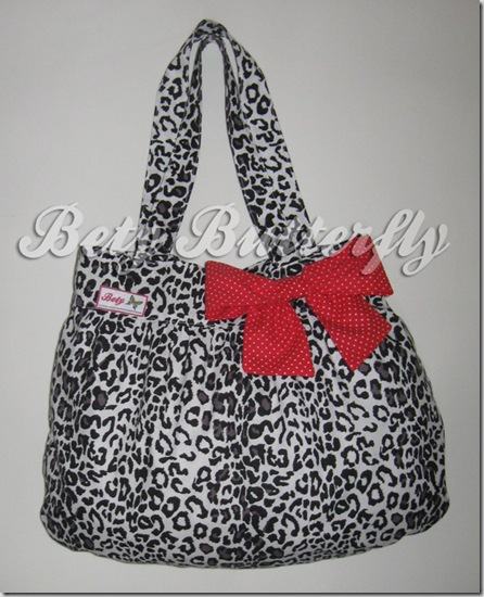 bolsa estamparia oncinha pintada