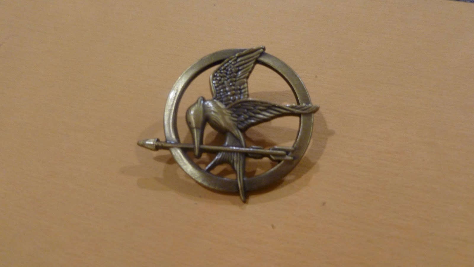 Download Hunger Games Merchandise: Replica Mockingjay Pin