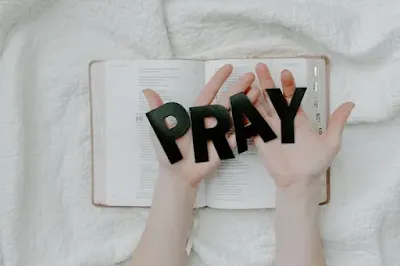 Pray text on the white backgroung