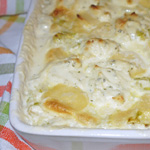 Gratin de quenelles aux courgettes et au fromage ail et fines herbes