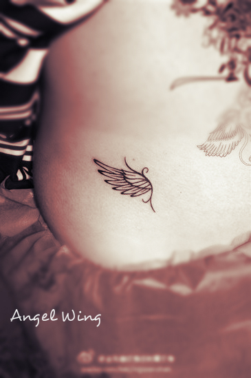 Elegant Angel Wing Tattoo