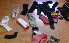 a floor full of single socks