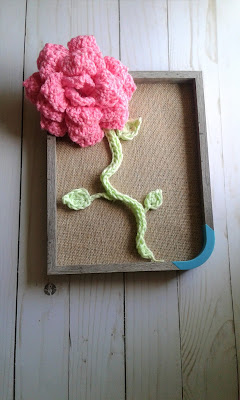 crochet flower in a frame