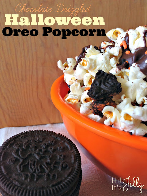 Chocolate Drizzled Halloween Oreo Popcorn from Hi! It's Jilly. SO easy and SO festive! #recipe #chocolate #halloween