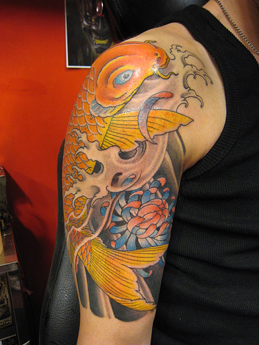 koifish tattoo. koi fish tattoo sleeve. koi