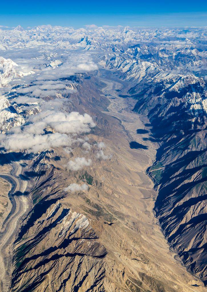 Aerial view of Hispar and Nagar valley. Aerial view of Gilgit Baltistan. Karakoram mountain range. Aerial view of Hispar valley Nagar towards longest Hispar Biafo glacier and Center Snow lake, Hispar La, Baintha Brakk(Ogre) 7265 m, Left K2 8611 m, Broad peak 8047 m, Gasherbrum Group Right Baltoro Kangri 7300 m, Chogolisa 7668 m, Masherbrum 7821 highest peaks of the Karakoram