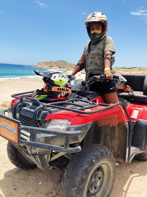 Miss Lauren Alston riding an ATV