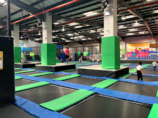 Image of a room filled with trampolines