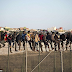 Heart Breaking Photos Of How Africans Sit Atop Border Fence In A Desperate Move To Get Into Spain 