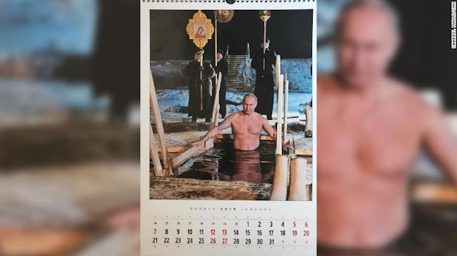 Vladimir Putin plays hockey and cuddles a puppy in new 2019 calendars