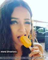 divya drishti serial actress mansi srivastava hot photo, indian tv actress mansi srivastava winking while eating delicious ice cream.