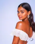 Indian girl, off shoulder white top, portrait shot, AI generated image, thumbnail image